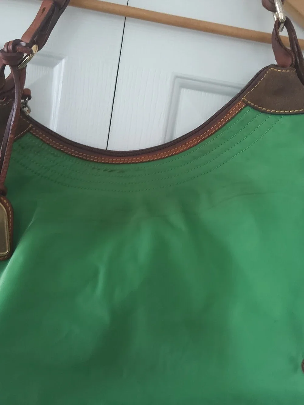 Dooney & Bourke logo you brown